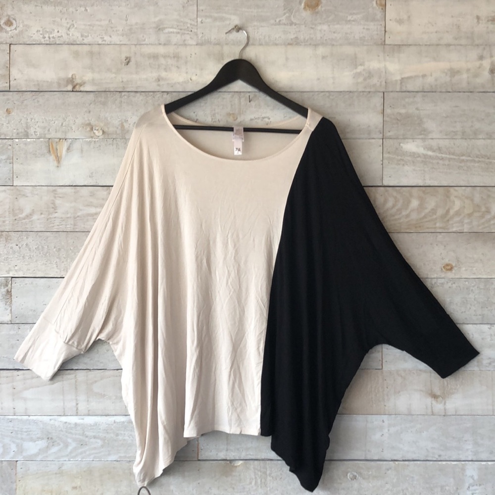 Oversize batwing Assymetrical top